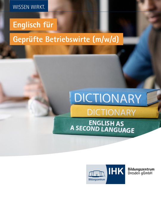 Wörterbuch Englisch auf Tisch mit Laptop